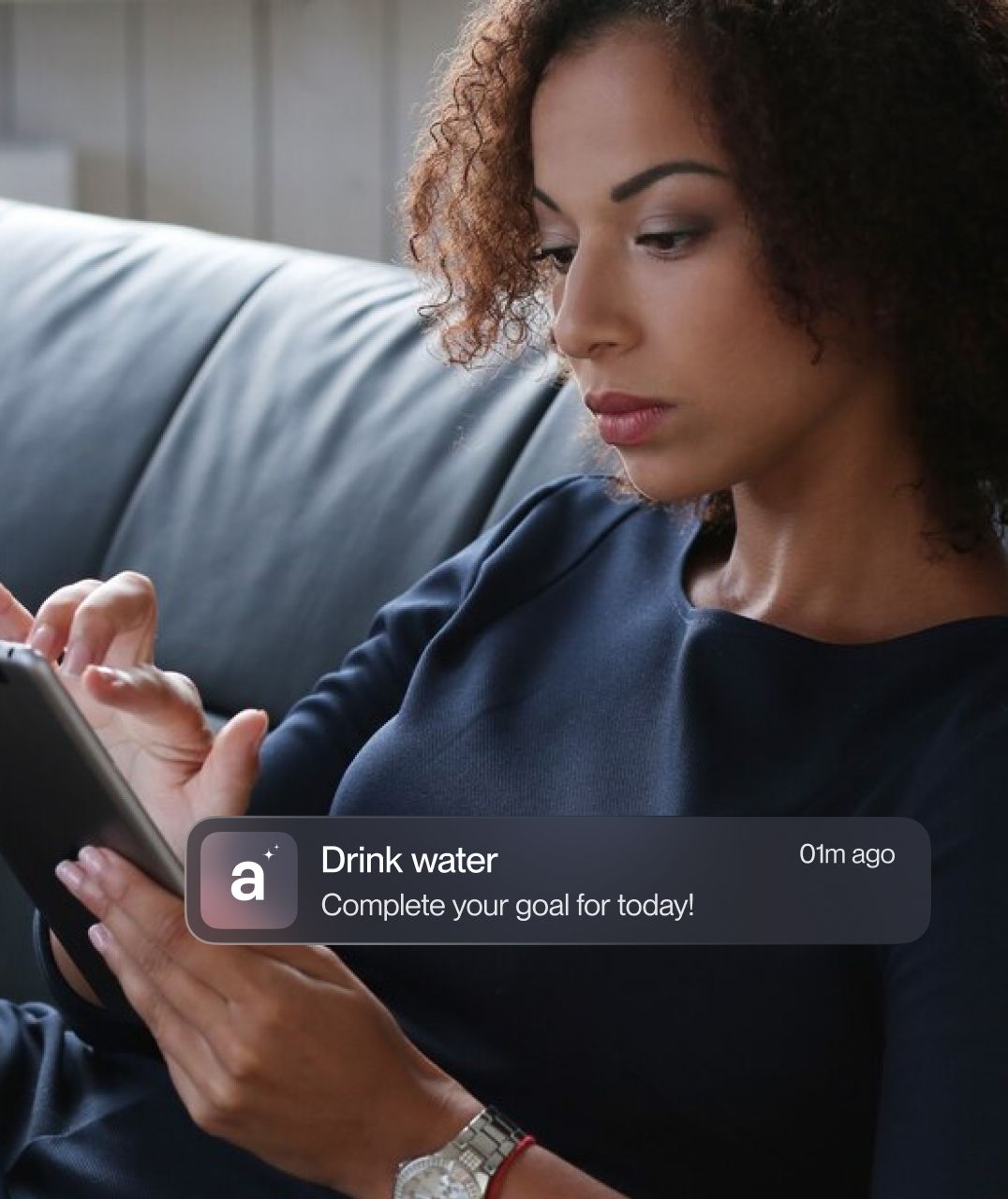woman looking at phone in her hand image with notification on it